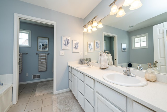 405 Anchors Way, Saint Joseph, MI 49085 - full bathroom featuring tile patterned flooring, double vanity, and baseboards