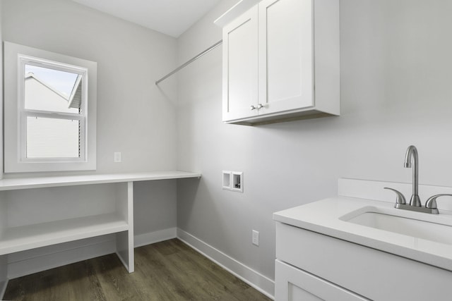 9423 Shoreway Dr, West Olive, MI 49460 - laundry room featuring cabinet space, hookup for a washing machine, baseboards, and dark wood finished floors