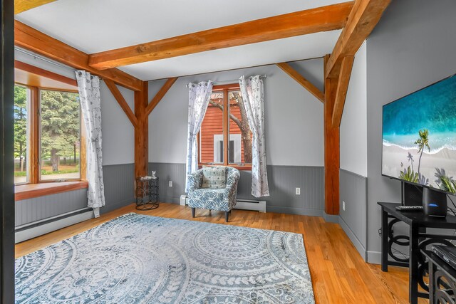 70191 Carolyn Ave, Sturgis, MI 49091 - sitting room featuring a wainscoted wall, a baseboard radiator, beam ceiling, and wood finished floors