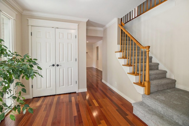 2314 Hickory Point Dr N, Portage, MI 49024 - stairway with wood finished floors, crown molding, and baseboards