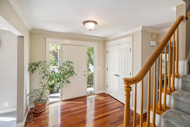 2314 Hickory Point Dr N, Portage, MI 49024 - entrance foyer featuring hardwood / wood-style flooring, stairway, ornamental molding, and baseboards