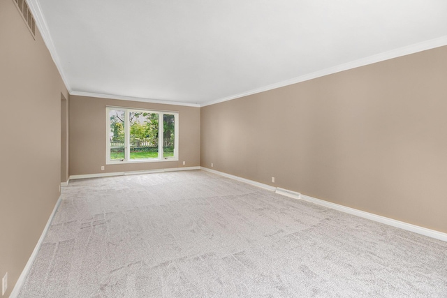 2314 Hickory Point Dr N, Portage, MI 49024 - spare room with crown molding, baseboards, and light colored carpet