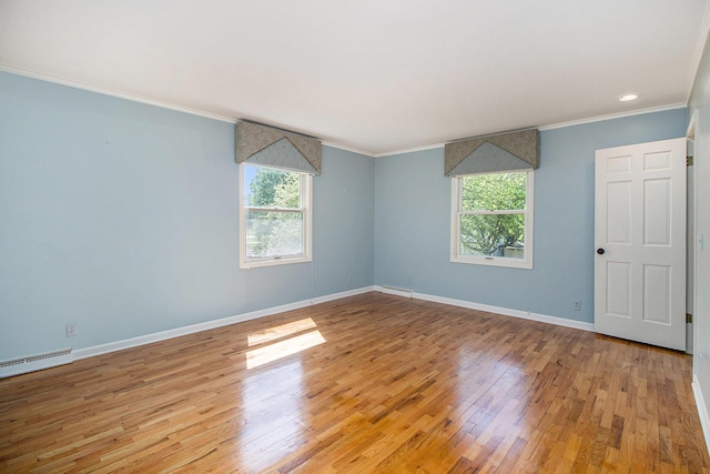 2314 Hickory Point Dr N, Portage, MI 49024 - spare room with ornamental molding, light wood-type flooring, baseboards, and recessed lighting