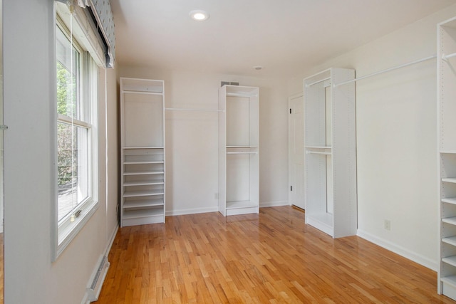 2314 Hickory Point Dr N, Portage, MI 49024 - unfurnished bedroom with light wood-type flooring, baseboards, and recessed lighting