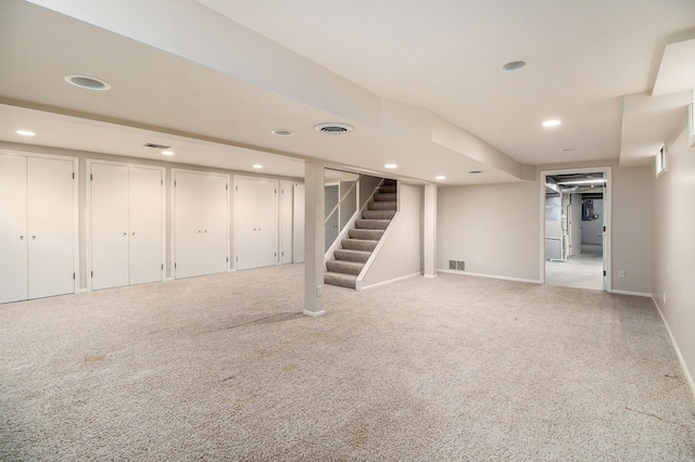2314 Hickory Point Dr N, Portage, MI 49024 - finished below grade area with stairs, recessed lighting, light colored carpet, and baseboards