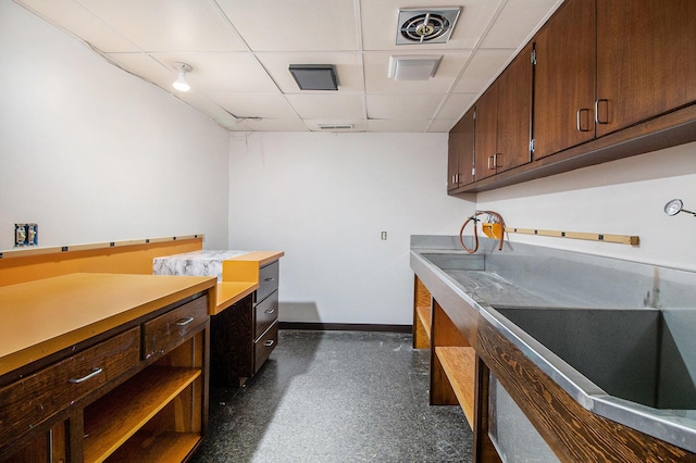 2314 Hickory Point Dr N, Portage, MI 49024 - laundry room with baseboards and a sink