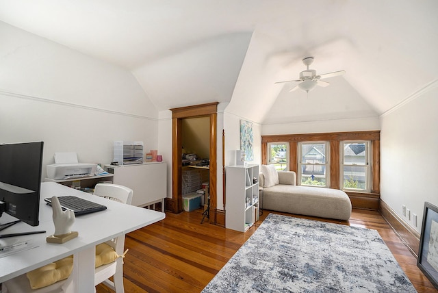 210 E St, Three Rivers, MI 49093 - bedroom with vaulted ceiling, a desk, wood finished floors, baseboards, and a ceiling fan