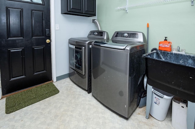 9017 N Main St, Berrien Springs, MI 49103 - laundry room featuring cabinet space, independent washer and dryer, and light flooring