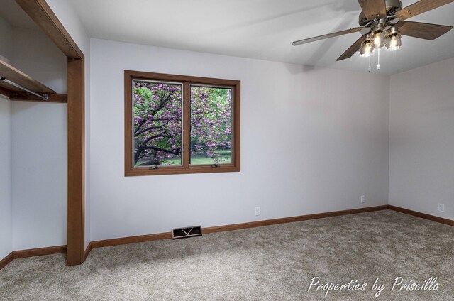 315 Hayes St NW, Comstock Park, MI 49321 - unfurnished bedroom with carpet and baseboards