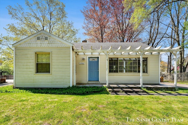 17300 W Spring Lake Rd, Spring Lake, MI 49456 - view of front facade featuring a pergola, roof with shingles, and a chimney