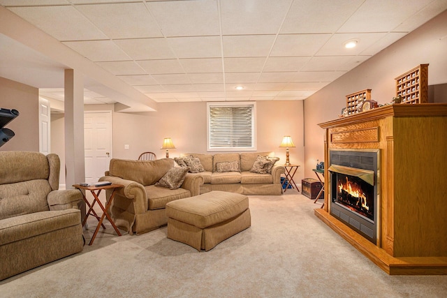 232 Embury Dr, Battle Creek, MI 49014 - living room featuring carpet, a glass covered fireplace, a drop ceiling, and recessed lighting
