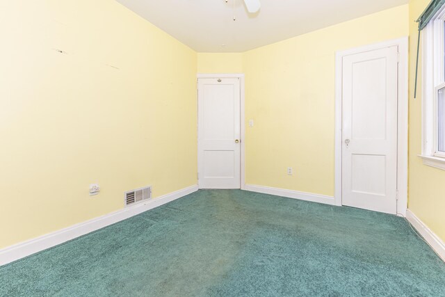 885 Hawthorne Ave, Ypsilanti, MI 48198 - carpeted spare room with baseboards and ceiling fan