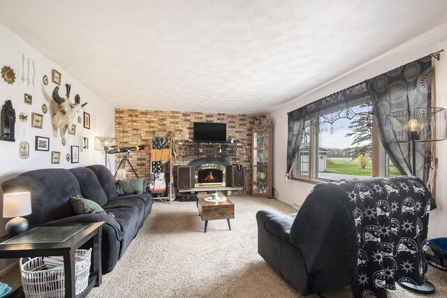 50427 M 51 N, Dowagiac, MI 49047 - living room featuring carpet flooring, a brick fireplace, a textured ceiling, and brick wall