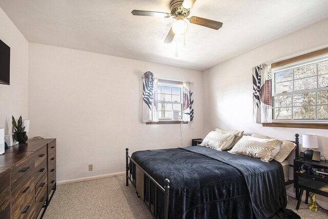 50427 M 51 N, Dowagiac, MI 49047 - bedroom featuring light colored carpet, baseboards, and ceiling fan