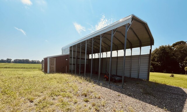 32867 Middle Crossing Rd, Dowagiac, MI 49047 - view of outdoor structure with driveway, a carport, and an outdoor structure