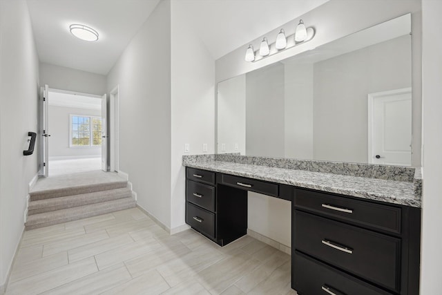 1840 Tapadera Dr, Ann Arbor, MI 48103 - bathroom featuring vanity and baseboards