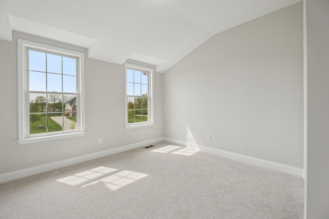 1840 Tapadera Dr, Ann Arbor, MI 48103 - spare room with lofted ceiling, baseboards, and carpet flooring