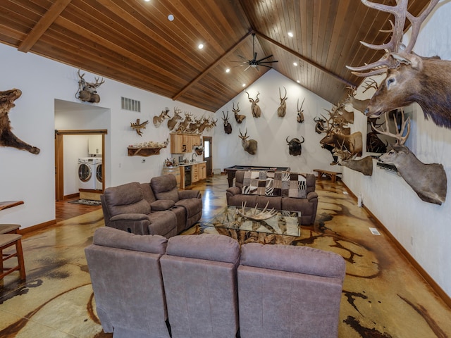 1518 M Dr S, East Leroy, MI 49051 - living room with washing machine and dryer, a wood ceiling with exposed beams, ceiling fan, recessed lighting, and high vaulted ceiling