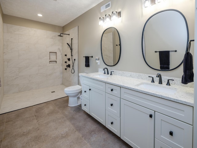 1518 M Dr S, East Leroy, MI 49051 - full bathroom with double vanity, tiled shower, and recessed lighting