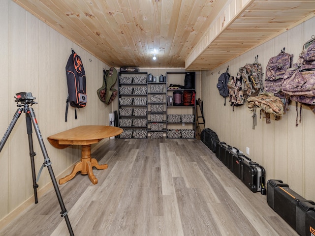1518 M Dr S, East Leroy, MI 49051 - living area with wood finished floors, wood ceiling, and wooden walls