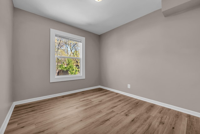 16568 Monica St, Detroit, MI 48221 - empty room featuring wood finished floors and baseboards