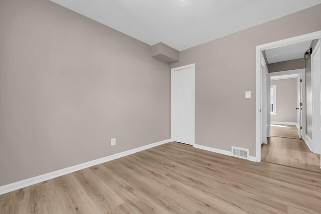 16568 Monica St, Detroit, MI 48221 - unfurnished bedroom with light wood-style flooring and baseboards