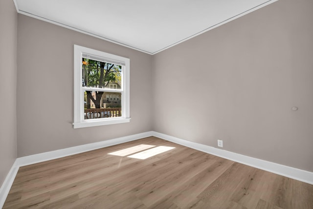 16568 Monica St, Detroit, MI 48221 - empty room with baseboards, wood finished floors, and crown molding