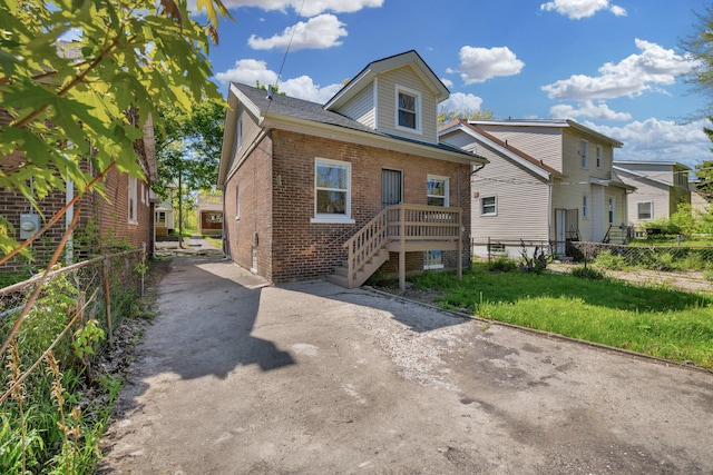 16568 Monica St, Detroit, MI 48221 - back of house featuring brick siding