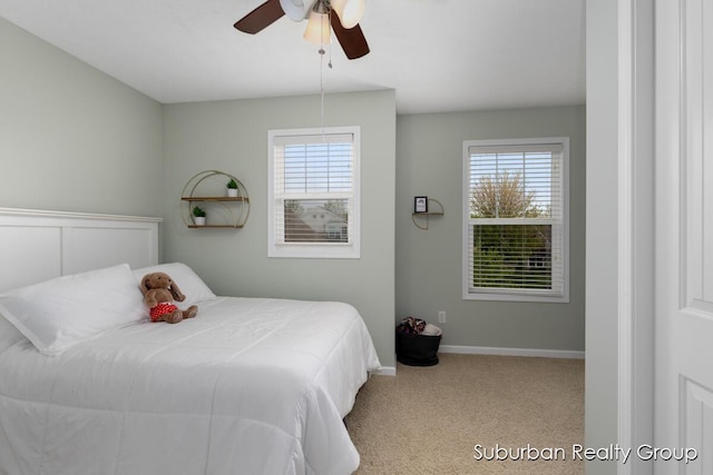 bedroom featuring carpet, ceiling fan, and baseboards