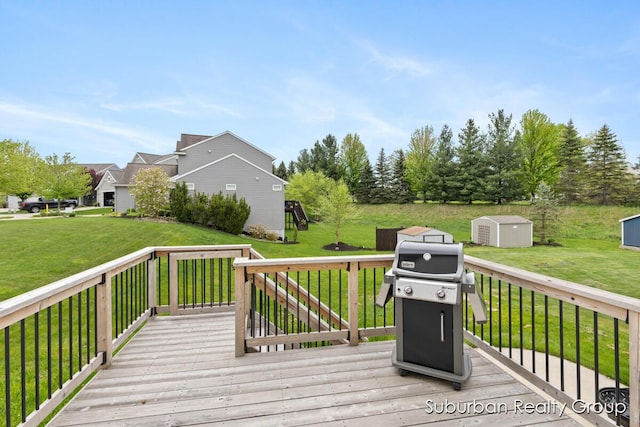 wooden terrace featuring a storage unit, grilling area, an outbuilding, a yard, and a residential view