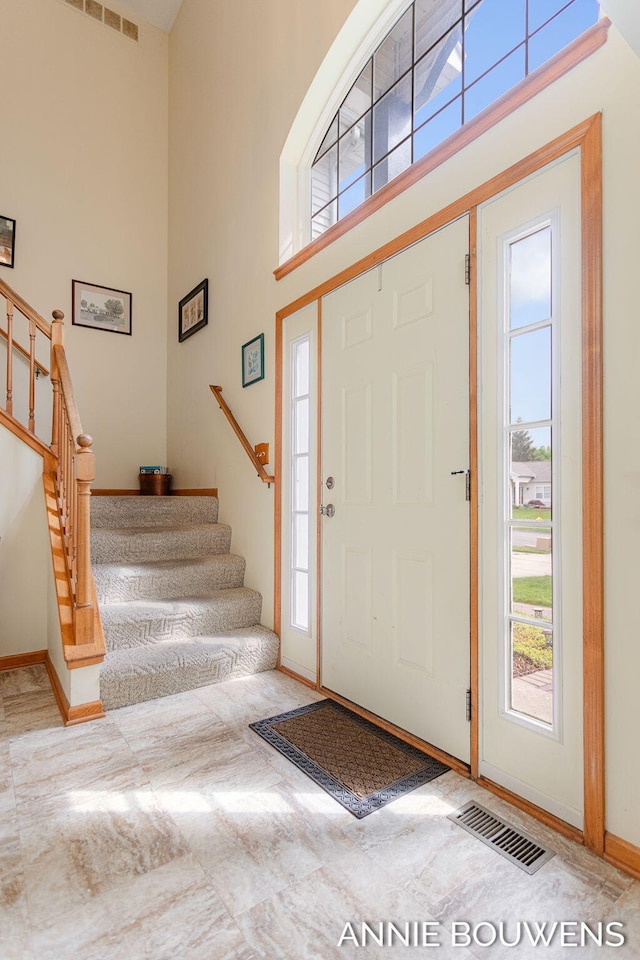 10852 Thornberry Way, Zeeland, MI 49464 - entryway with a high ceiling and stairway