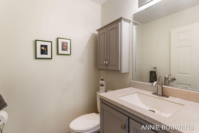 10852 Thornberry Way, Zeeland, MI 49464 - bathroom featuring toilet and vanity
