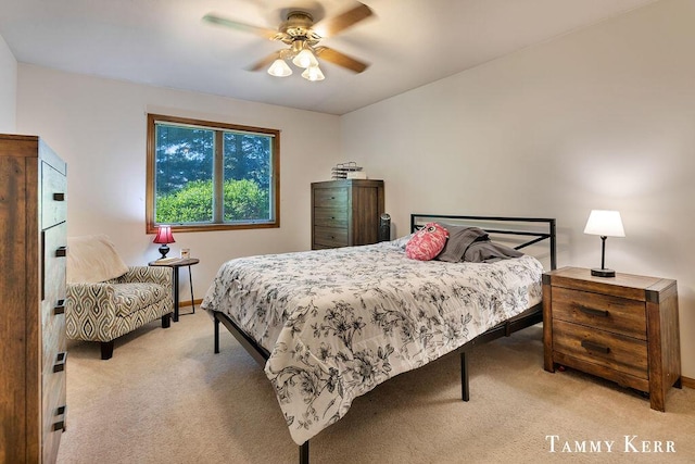 940 Laketown Dr, Holland, MI 49423 - bedroom featuring light colored carpet, baseboards, and ceiling fan