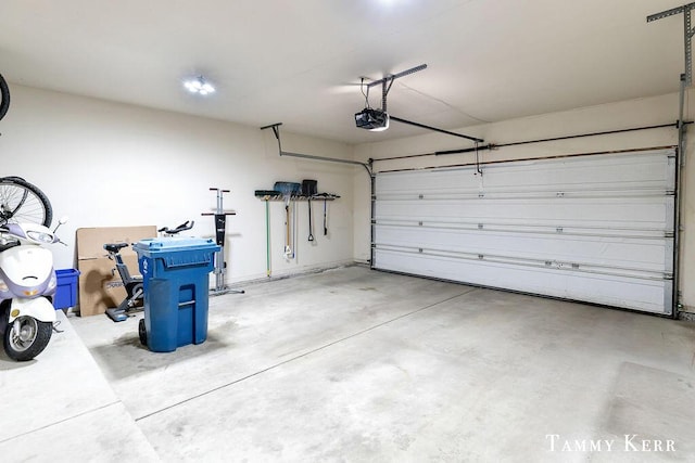 940 Laketown Dr, Holland, MI 49423 - garage with a garage door opener