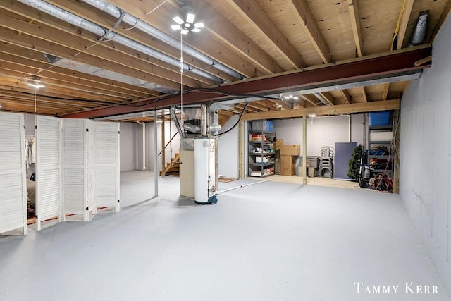 940 Laketown Dr, Holland, MI 49423 - unfinished below grade area featuring gas water heater and stairs