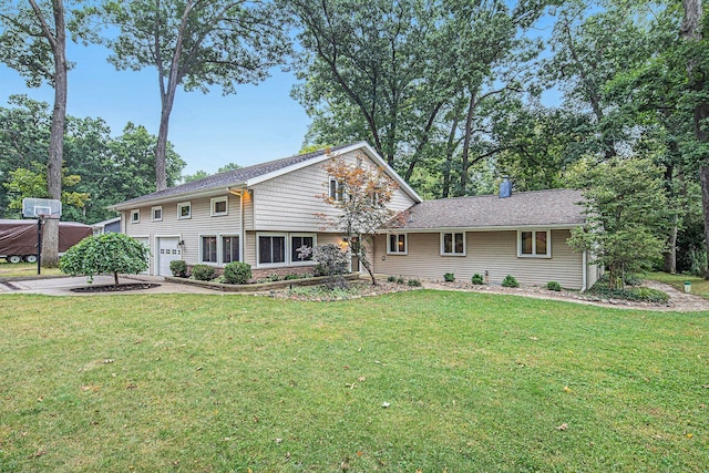 1514 Ferndale Blvd, Niles, MI 49120 - view of front facade featuring concrete driveway, a front yard, and a garage