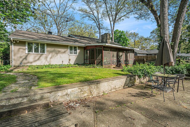 1514 Ferndale Blvd, Niles, MI 49120 - back of house featuring a sunroom, a chimney, central air condition unit, and a patio area