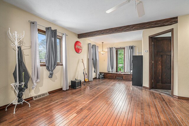 1514 Ferndale Blvd, Niles, MI 49120 - unfurnished room with hardwood / wood-style floors, beam ceiling, ceiling fan, and baseboards