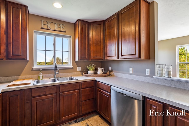 4865 Rapid River Ave SW, Wyoming, MI 49418 - kitchen featuring dishwasher, a sink, light countertops, and light tile patterned floors