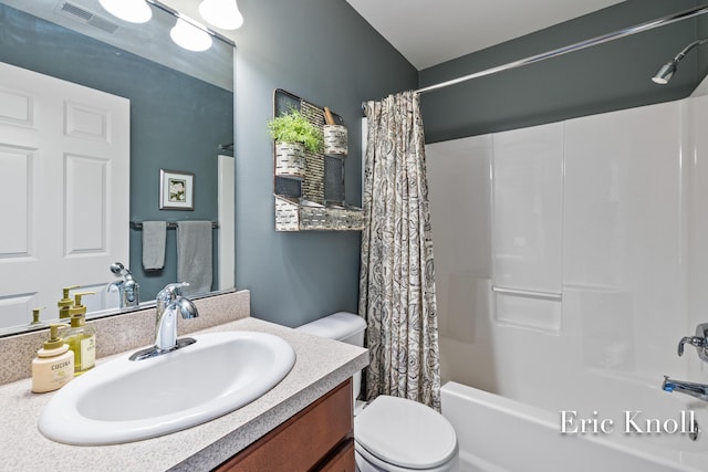 4865 Rapid River Ave SW, Wyoming, MI 49418 - full bath with vanity, shower / bath combo with shower curtain, and toilet