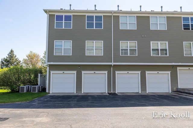 4865 Rapid River Ave SW, Wyoming, MI 49418 - back of house with central AC