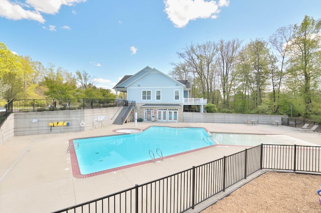 4865 Rapid River Ave SW, Wyoming, MI 49418 - community pool featuring a patio