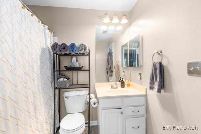 3185 Windcrest Dr NE, Grand Rapids, MI 49525 - bathroom with toilet and vanity
