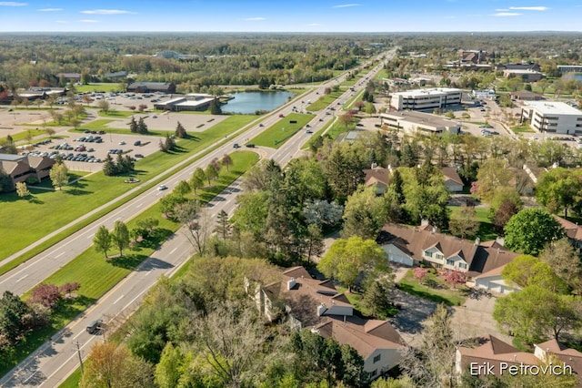 3185 Windcrest Dr NE, Grand Rapids, MI 49525 - aerial overview of property's location featuring a nearby body of water