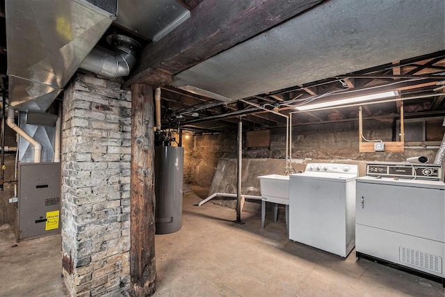 918 Kalamazoo Ave SE, Grand Rapids, MI 49507 - unfinished below grade area with water heater, washing machine and dryer, a sink, and heating unit