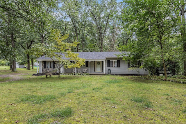 13195 Rainbow Dr, Gregory, MI 48137 - ranch-style home featuring a front lawn, a porch, and a shingled roof