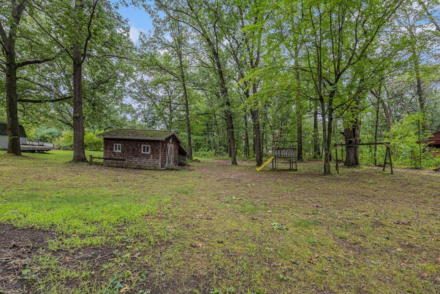 13195 Rainbow Dr, Gregory, MI 48137 - view of yard with an outdoor structure