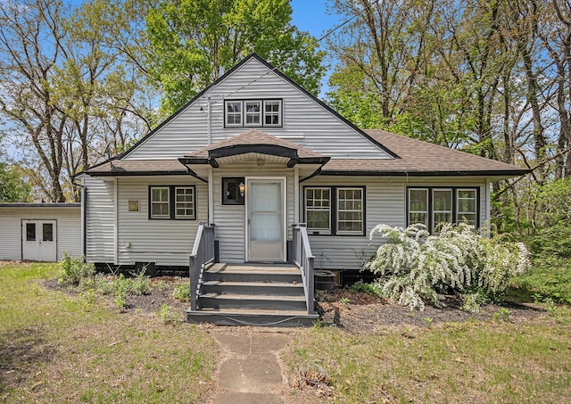 7566 Red Arrow Hwy, Stevensville, MI 49127 - bungalow-style home featuring a shingled roof