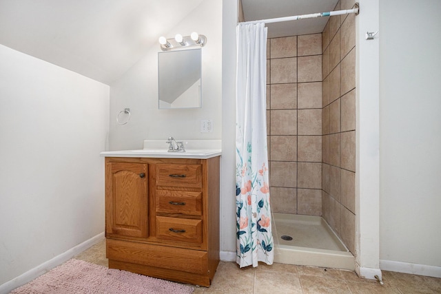 7566 Red Arrow Hwy, Stevensville, MI 49127 - bathroom featuring a tile shower, vanity, baseboards, and tile patterned floors