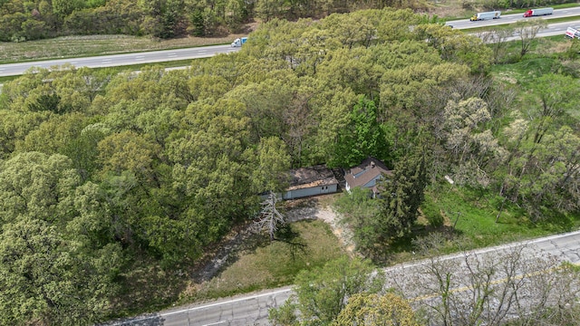 7566 Red Arrow Hwy, Stevensville, MI 49127 - aerial view of property and surrounding area featuring a heavily wooded area